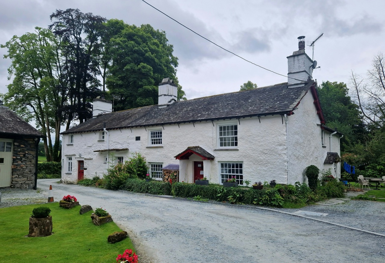 A bright, welcoming Lake District holiday cottage living room ready for guests